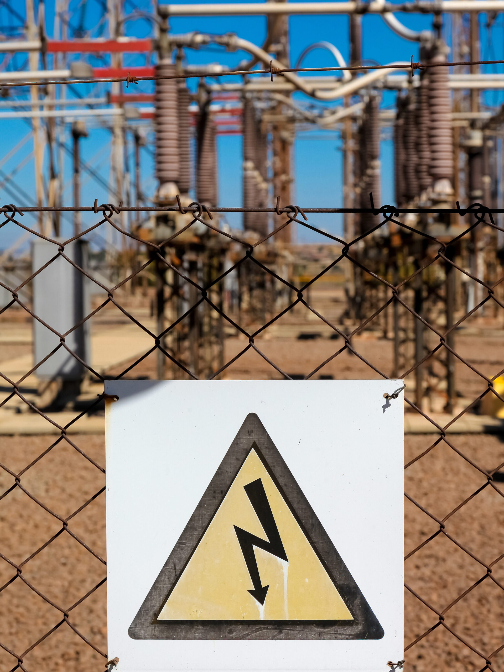 selective focus shot of danger sign of high voltage electricity